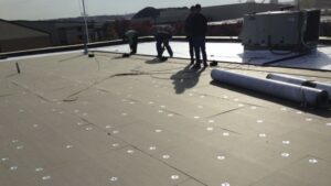 commercial roof inspection during construction